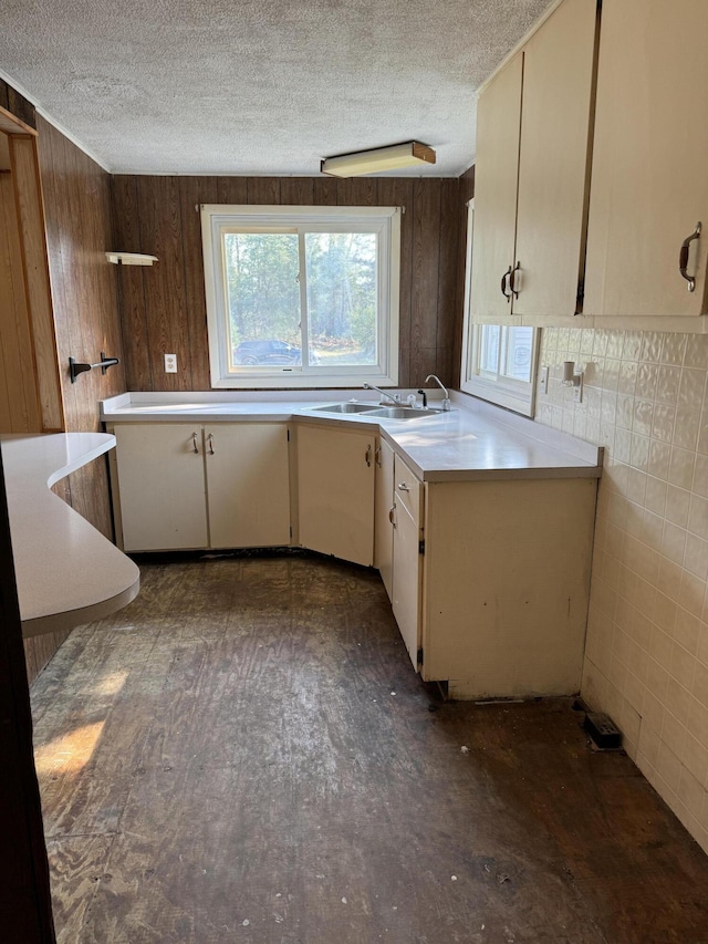 kitchen with cream cabinets and sink