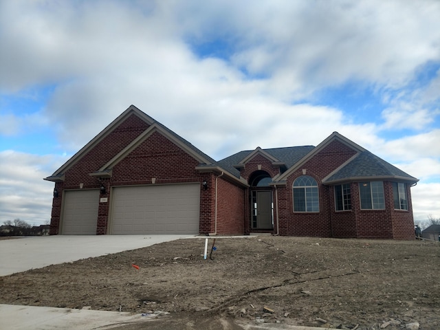 view of front of home with a garage