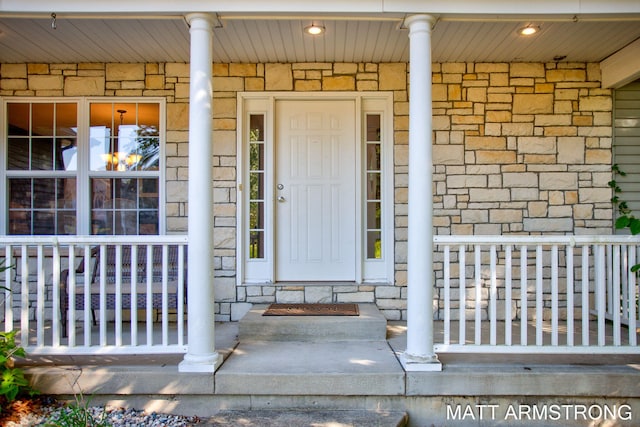 entrance to property with a porch