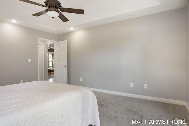 bedroom with ceiling fan and carpet floors