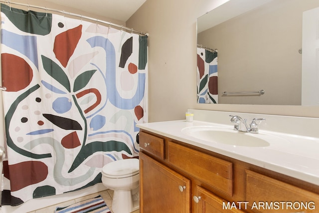 bathroom featuring vanity, toilet, curtained shower, and tile patterned floors