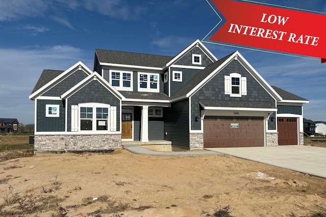 craftsman house with a garage