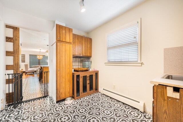 kitchen with a baseboard radiator