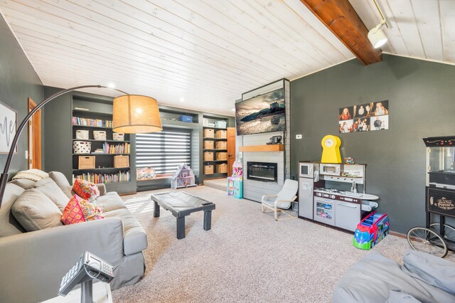 carpeted living room featuring wooden ceiling, a fireplace, lofted ceiling with beams, and built in features