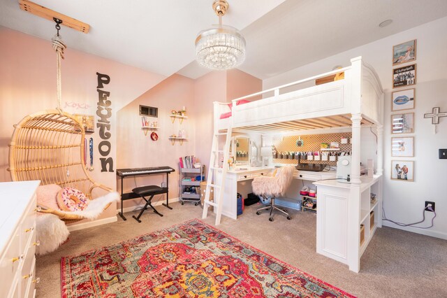 carpeted bedroom featuring an inviting chandelier