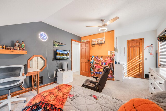 bedroom featuring light carpet, lofted ceiling, and ceiling fan