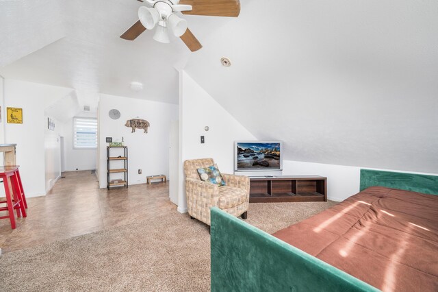 living room featuring carpet, lofted ceiling, and ceiling fan