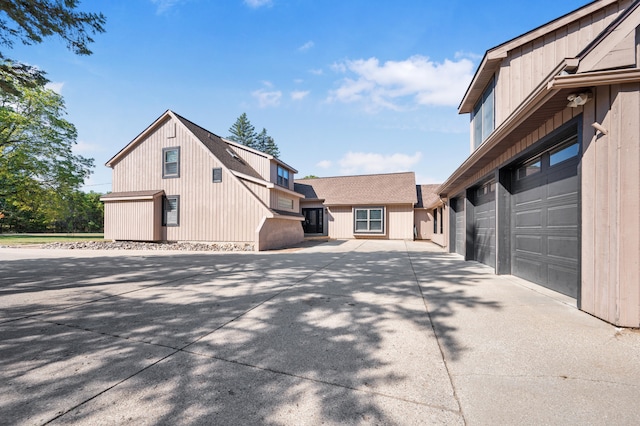 exterior space with a garage