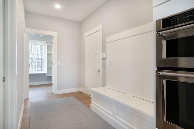 mudroom with light wood-type flooring