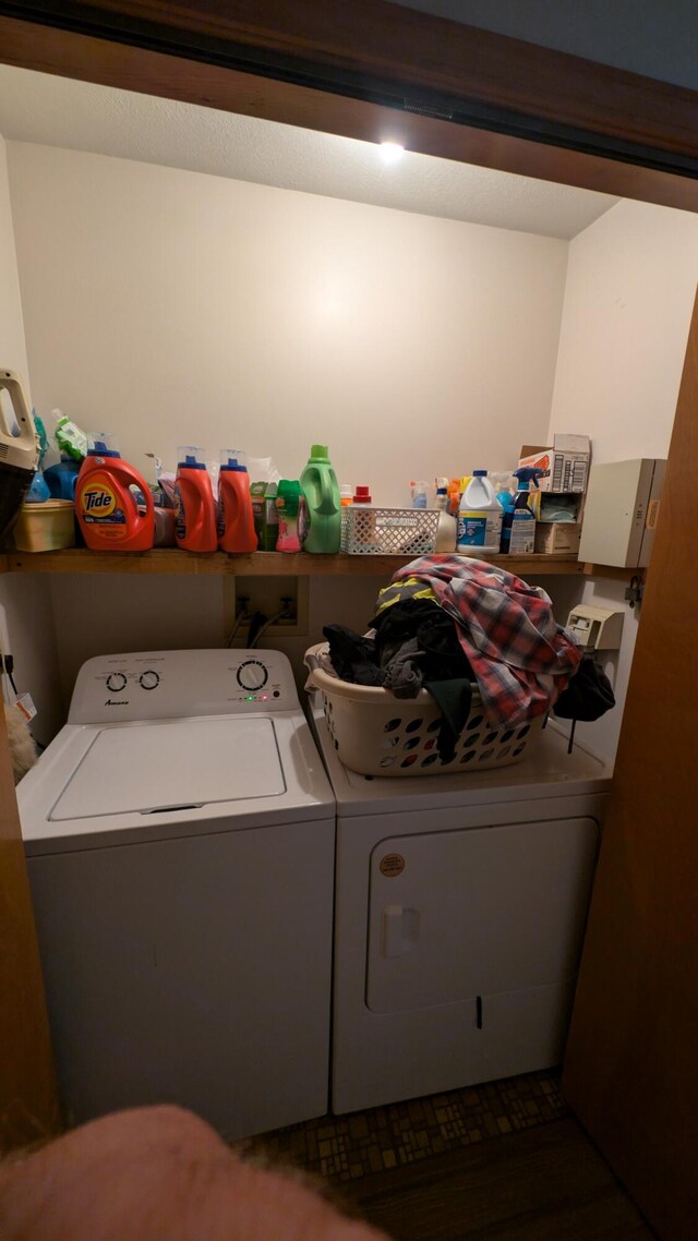 laundry room featuring washing machine and dryer