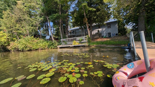 view of dock with a water view