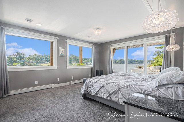carpeted bedroom with access to exterior, a baseboard radiator, baseboard heating, baseboards, and an inviting chandelier
