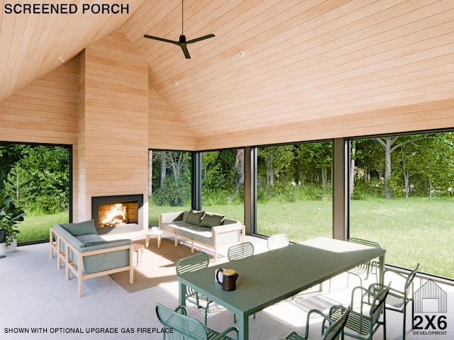 view of patio / terrace featuring ceiling fan and an outdoor living space with a fireplace