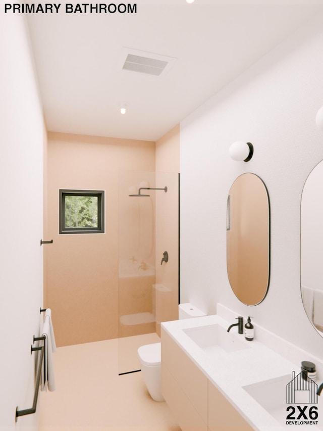 bathroom with vanity, tile patterned floors, toilet, and tiled shower