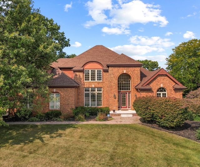 view of front of property with a front lawn