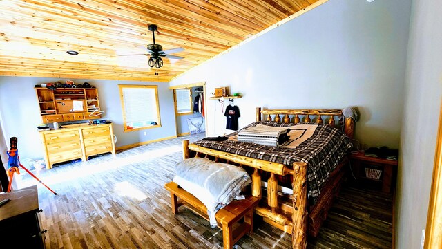 bedroom with lofted ceiling, ceiling fan, wooden ceiling, and dark wood-type flooring