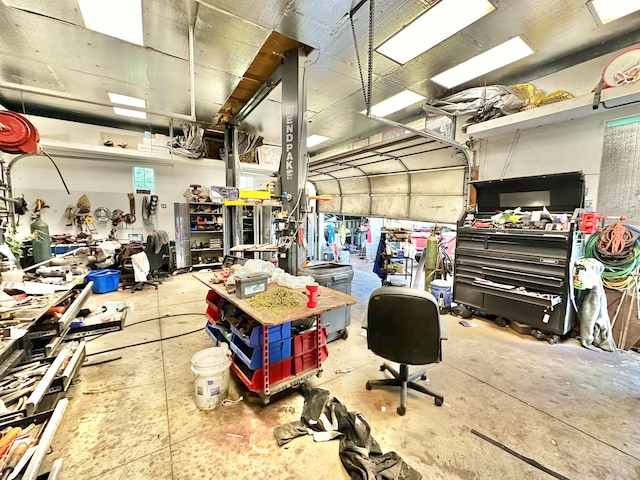 garage featuring a workshop area