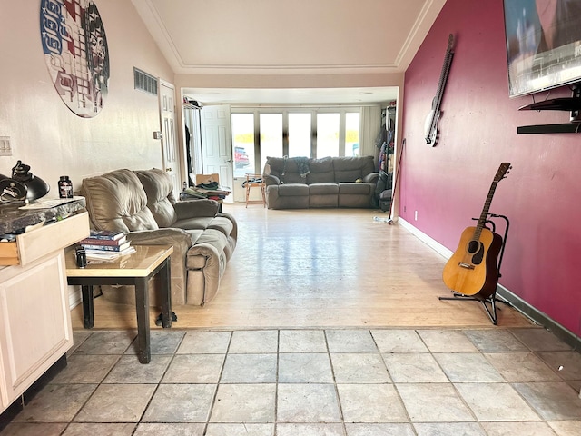 living room with lofted ceiling, ornamental molding, and hardwood / wood-style floors