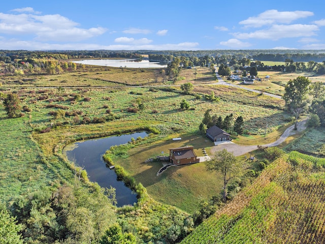 bird's eye view featuring a rural view and a water view