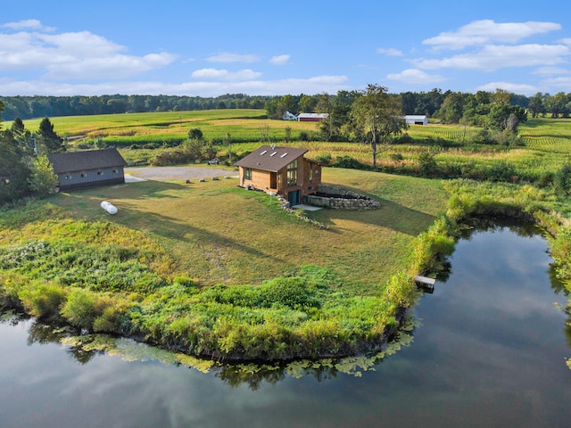 bird's eye view featuring a water view and a rural view