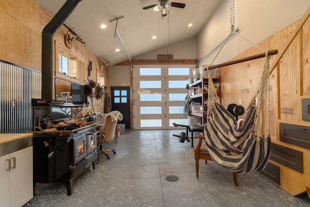 interior space featuring ceiling fan, french doors, and high vaulted ceiling