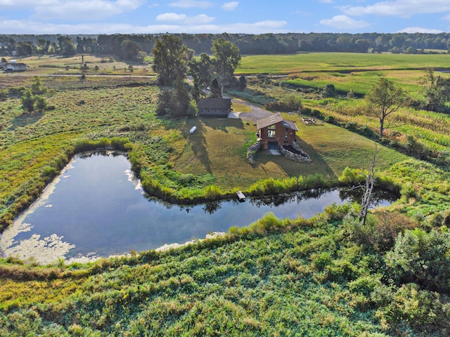 birds eye view of property featuring a rural view and a water view