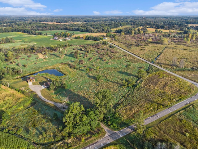 aerial view featuring a water view and a rural view