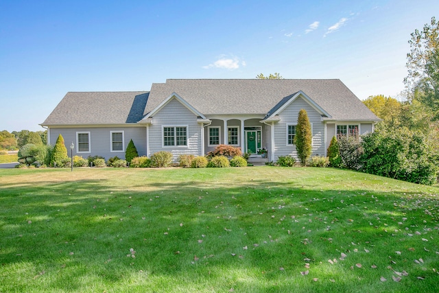 ranch-style house featuring a front lawn