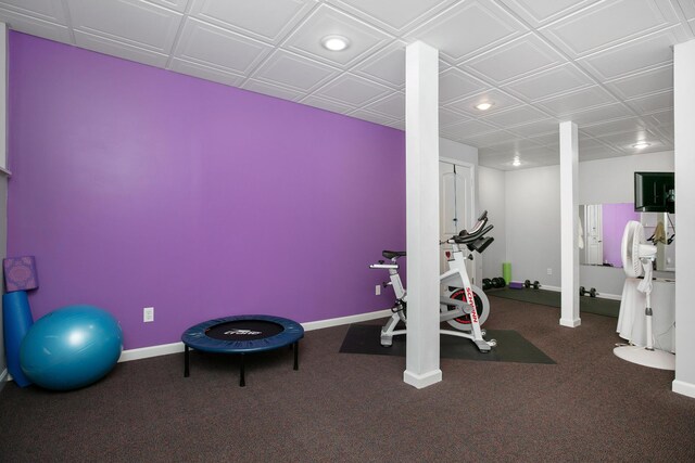 exercise room featuring carpet flooring