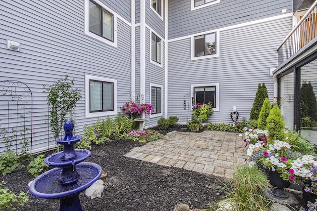 doorway to property featuring a patio area