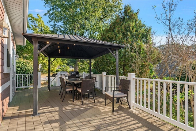 202 Oak St, South Haven, MI 49090 - wooden terrace with a gazebo, outdoor dining area, and area for grilling