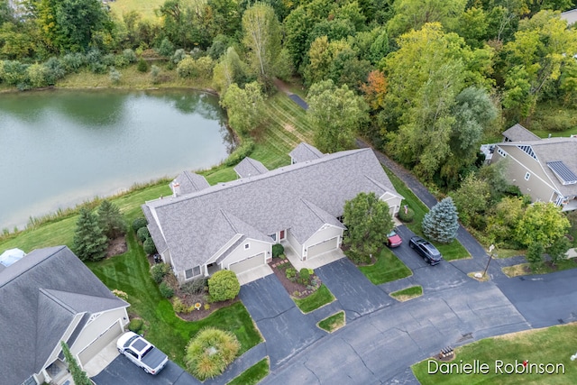 bird's eye view with a water view