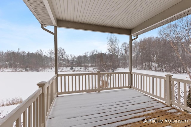 view of snow covered deck