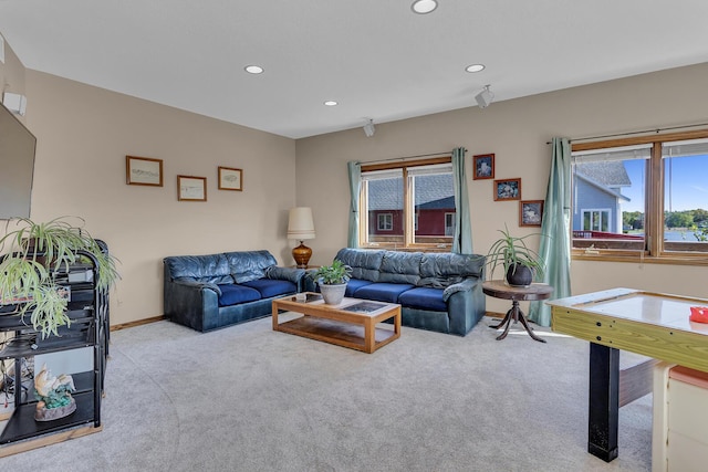 carpeted living room with baseboards and recessed lighting
