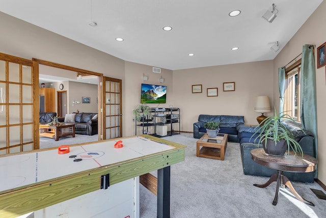 rec room featuring french doors, baseboards, visible vents, carpet, and recessed lighting
