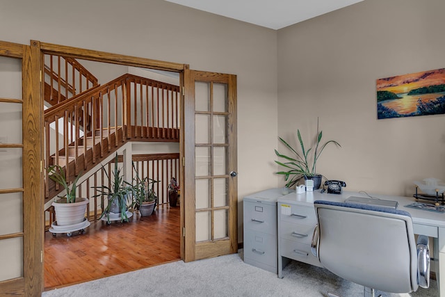 office area featuring french doors and light hardwood / wood-style flooring