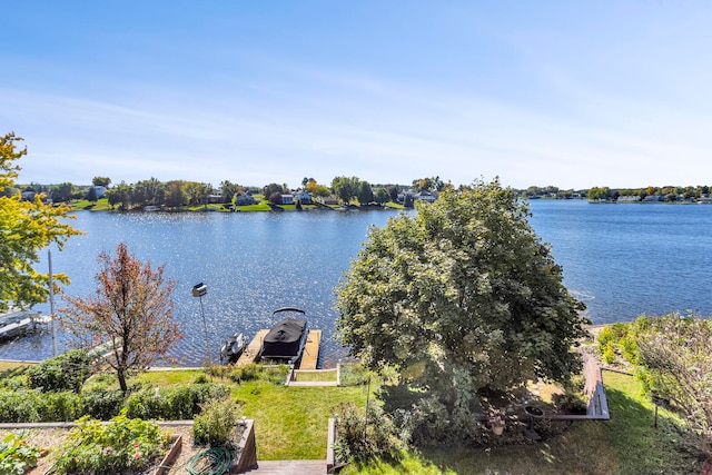 view of water feature with a dock