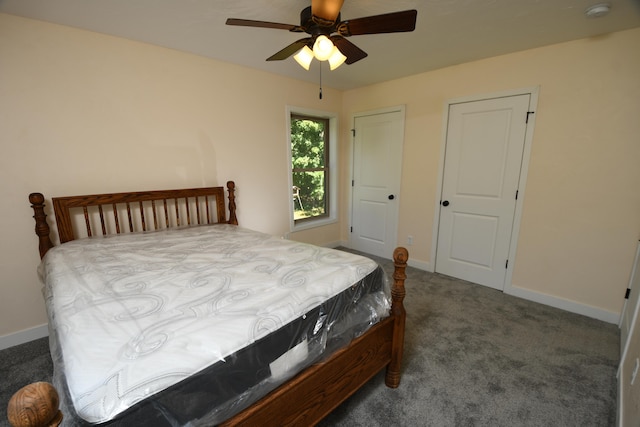 carpeted bedroom featuring ceiling fan