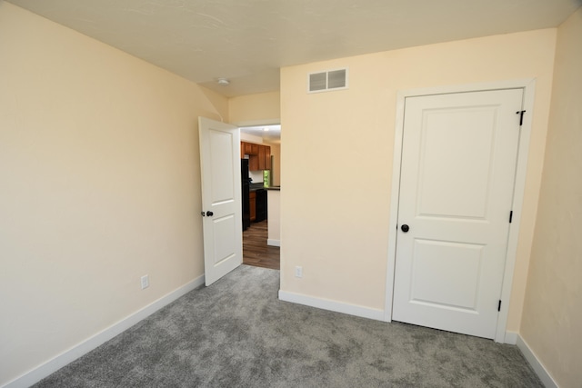 unfurnished bedroom featuring carpet floors