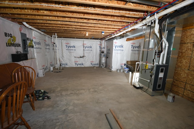 basement with heating unit and water heater