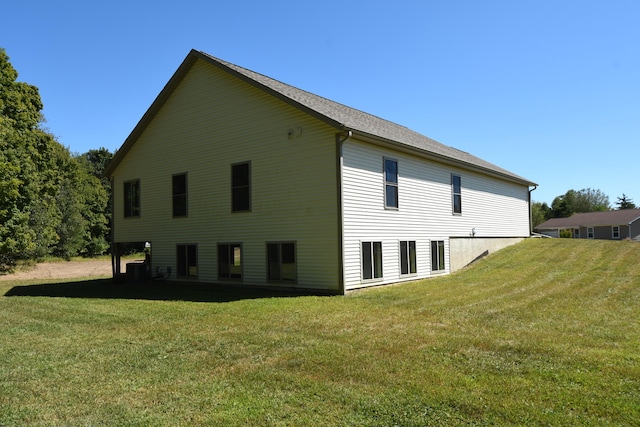 view of property exterior featuring a yard