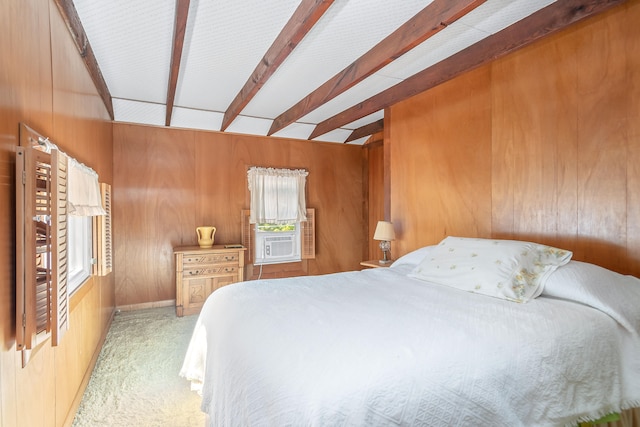 bedroom with light carpet, cooling unit, beamed ceiling, and wood walls