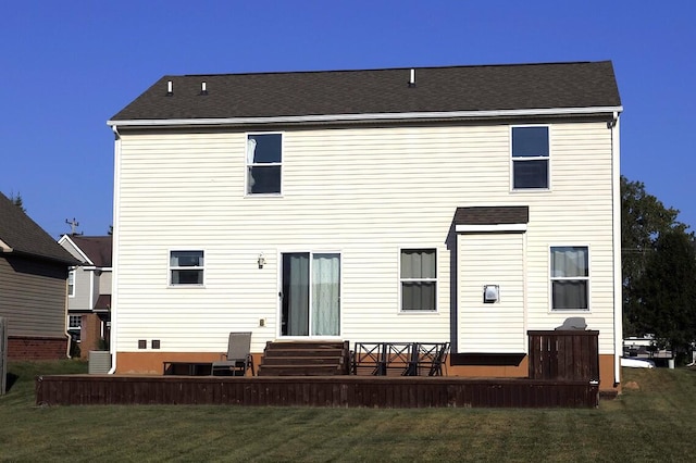 rear view of property featuring a deck, a yard, and central air condition unit