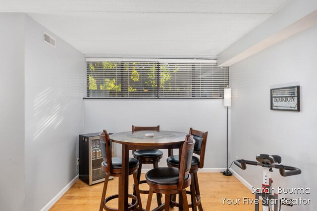 dining area with light hardwood / wood-style flooring