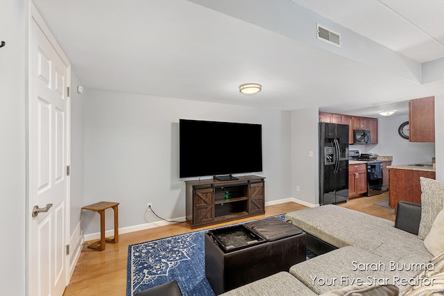 living room featuring light hardwood / wood-style floors