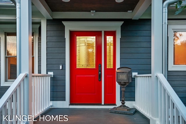 entrance to property with covered porch