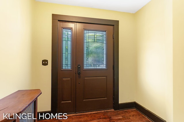 entryway featuring dark wood-type flooring