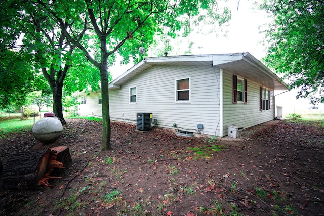 view of home's exterior with central AC