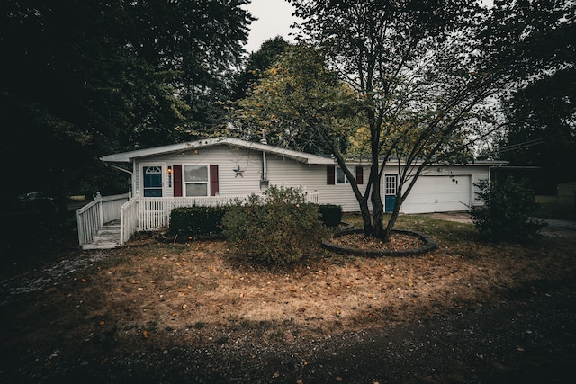 view of front of property featuring a garage