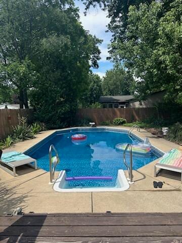 view of pool featuring a deck